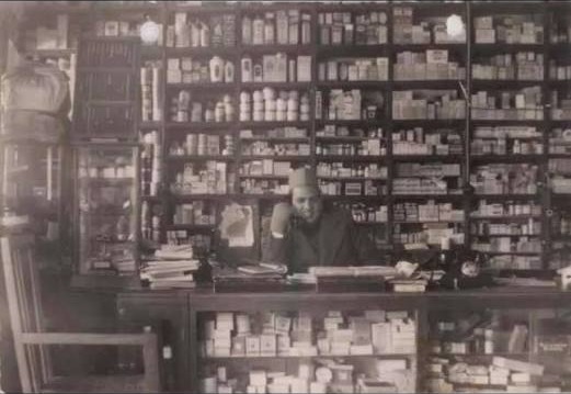 The family shopkeeper at the heritage counter